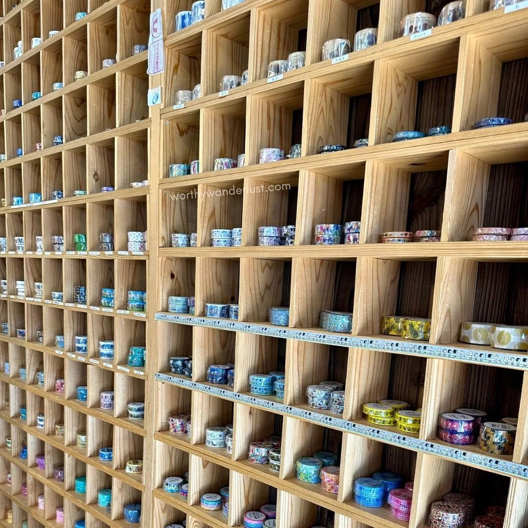 A cabinet displaying a wide array of washi tape in Kurashiki