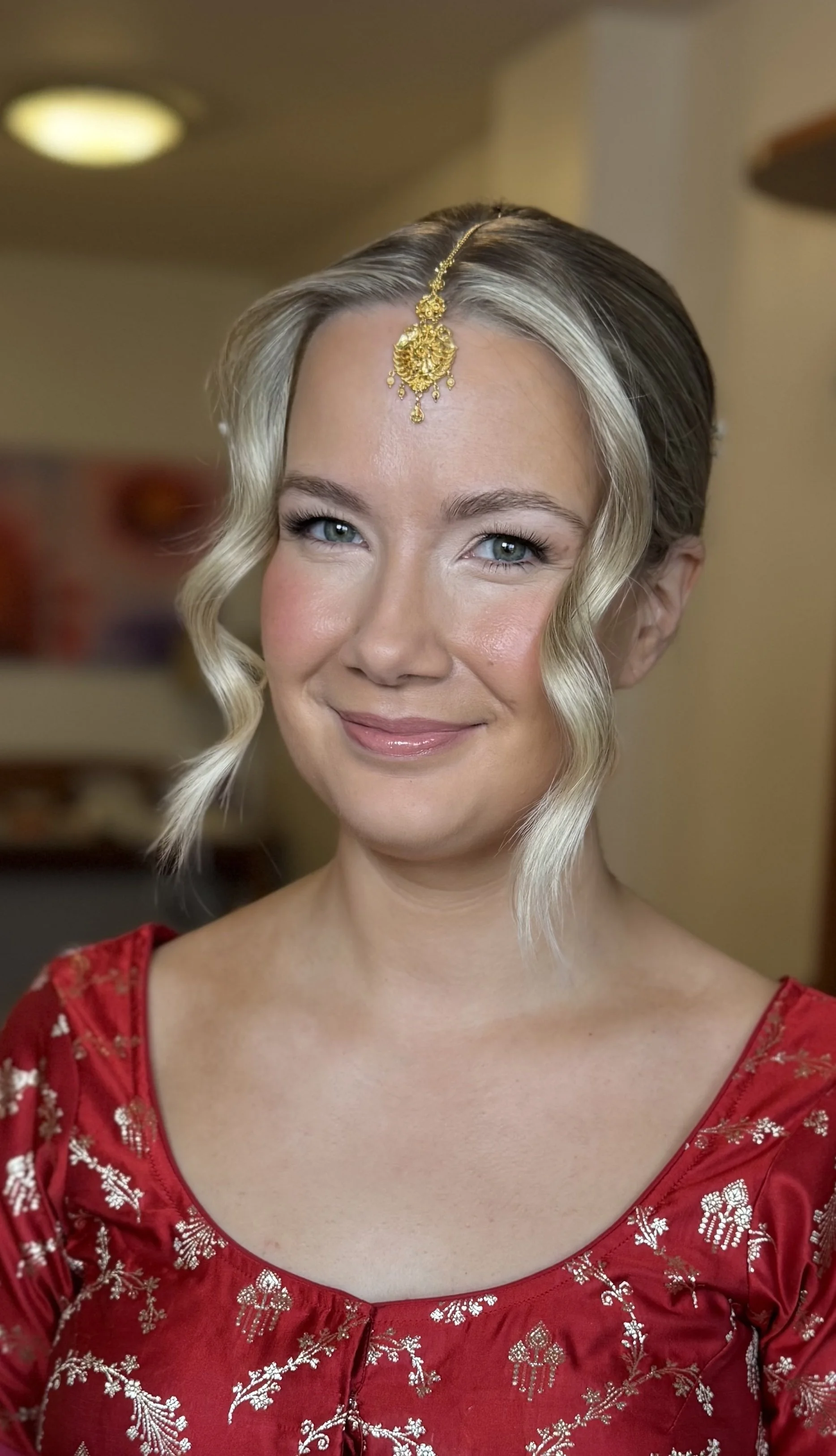 A caucasian bride in traditional nepalese wedding outfit.
