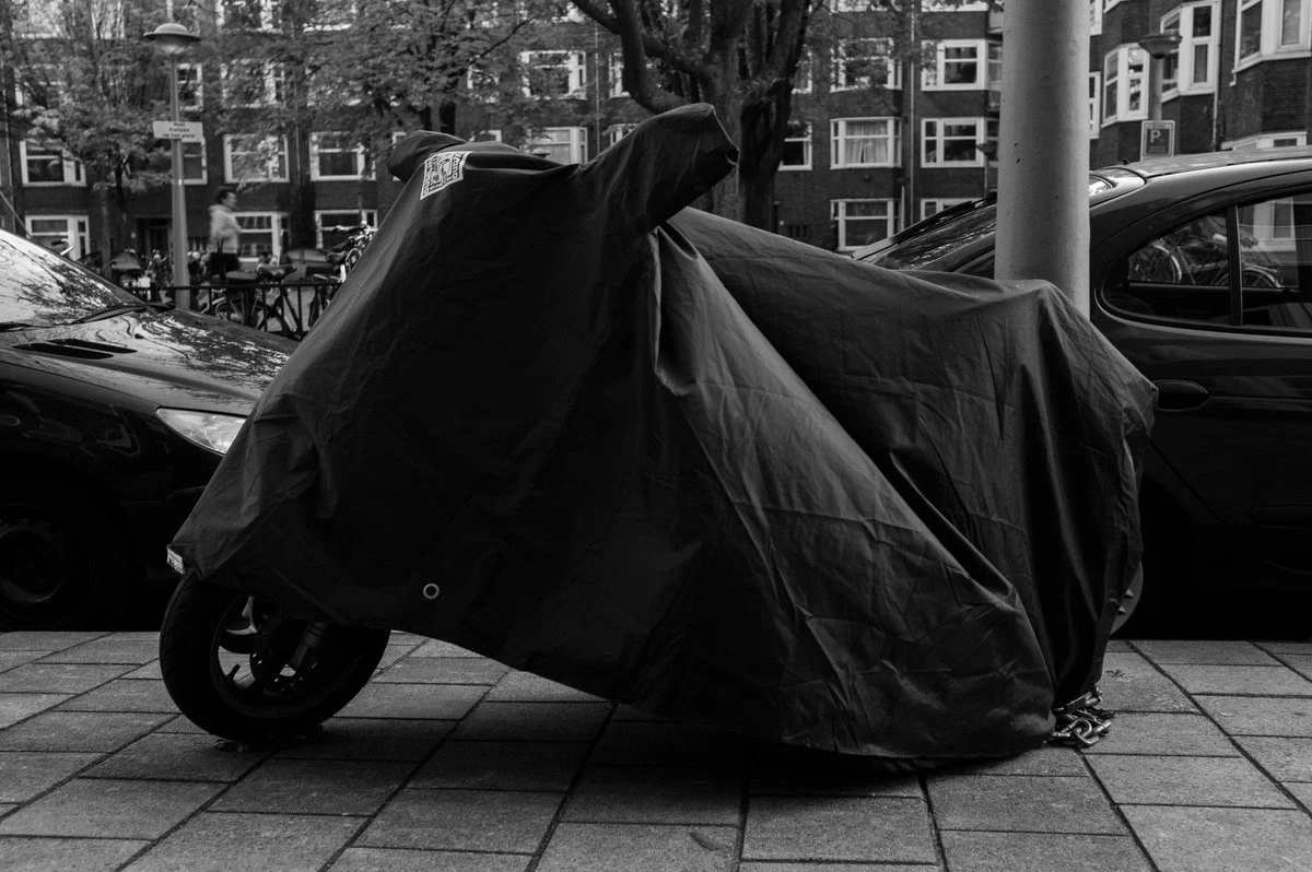 Photograph of a vehicle covered for protection