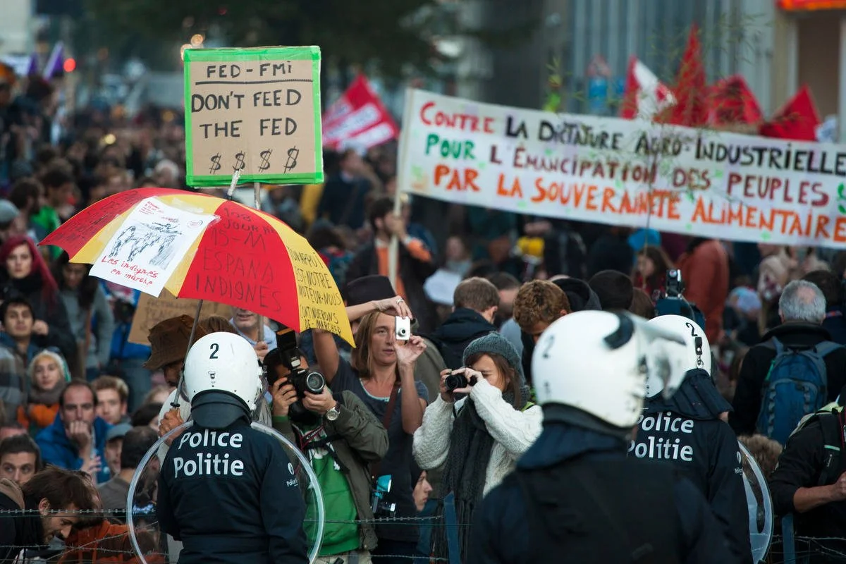 Photojournalist in Brussels for portraits, protests and other events