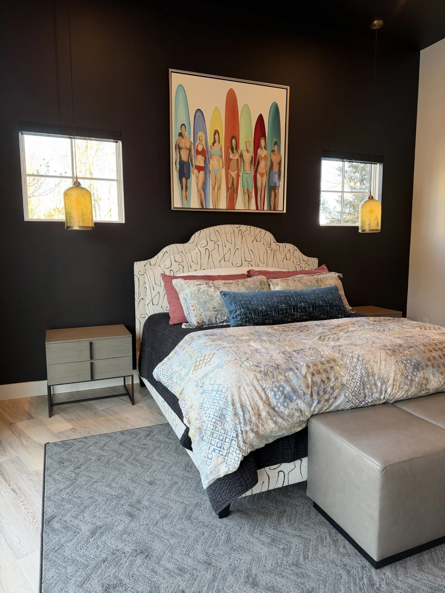 Bold modern beach house design in Rehoboth Beach for a Lititz PA couple featuring scribble wallpaper, teal sofas, citron dining chairs, and a dramatic black bedroom. A colorful modern coastal home designed for entertaining and summer living.