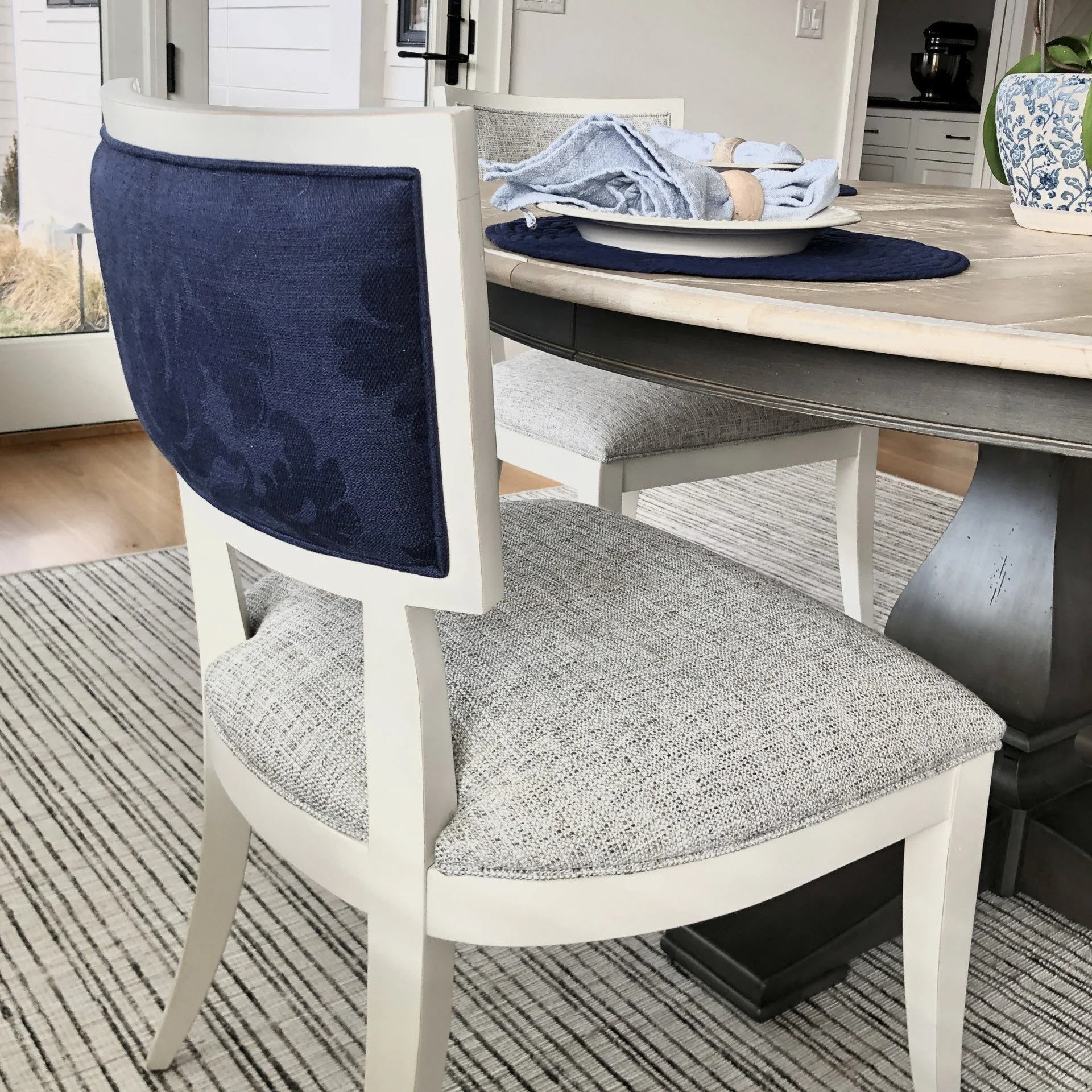 interior design ethan allen close up dining chair contrast fabric blue black and white textured rug farmhouse table custom