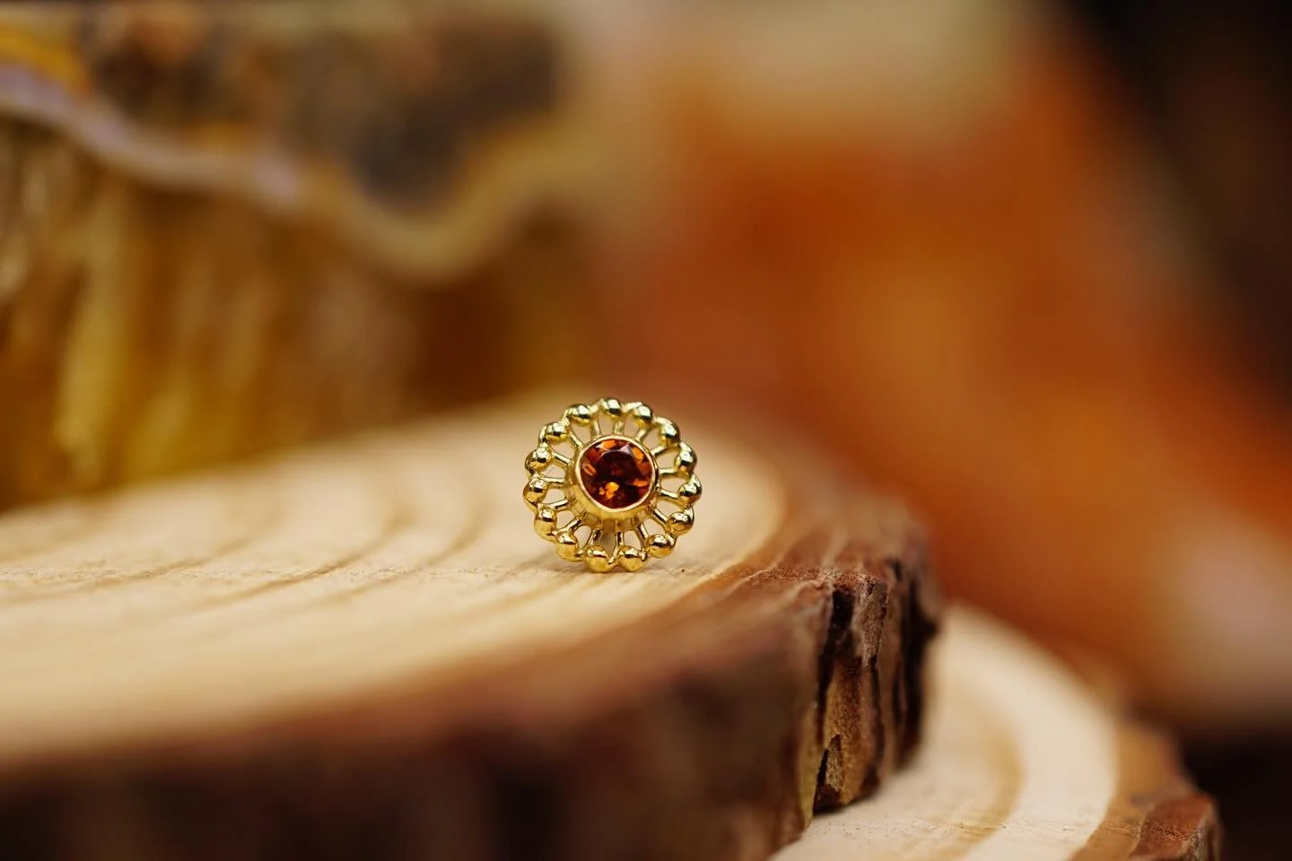 Meet one of our all time favorite most versatile designs! The &lsquo;Virtue&rsquo; by @anatometalinc. Pictured here with an 18kt gold border and a round citrine in the center. ✨

#ceremonypiercing #safepiercing #workerowned #queerowned #finejewelry #