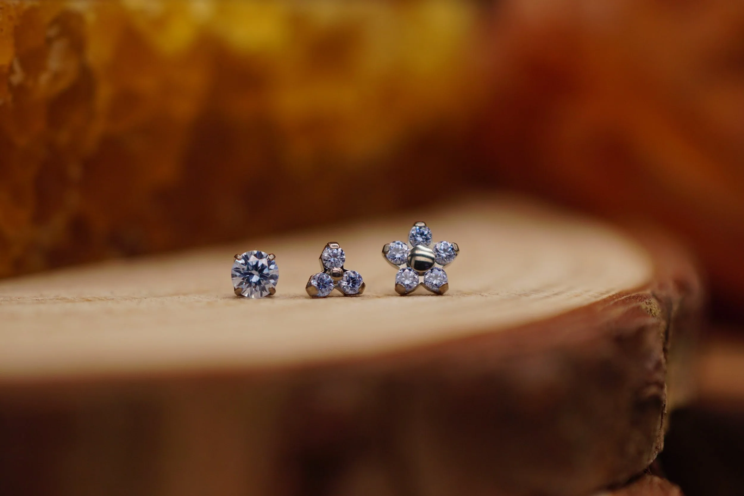 Last year our friends over at @neometaljewelry released some limited edition stone colors set in titanium. We still have a few Grey Blue and Tanzanite pieces in stock! 

Get them while they&rsquo;re still available, here at @ceremonypiercing. ✨

#cer