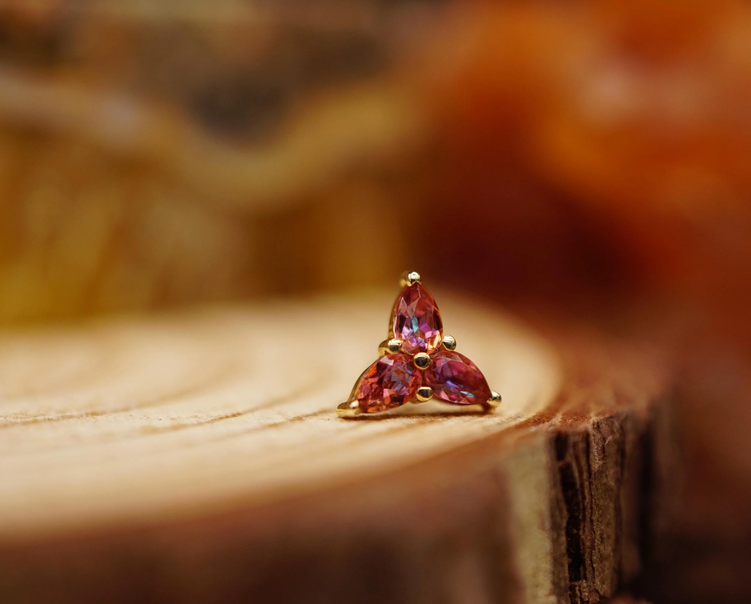 Warmer weather brings warmer gems! Meet one of our most dazzling designs with three pear shaped Anastasia Topaz set in 14kt gold by @bvla. ✨

#ceremonypiercing #workerowned #baltimorepiercing #safepiercing #bvla