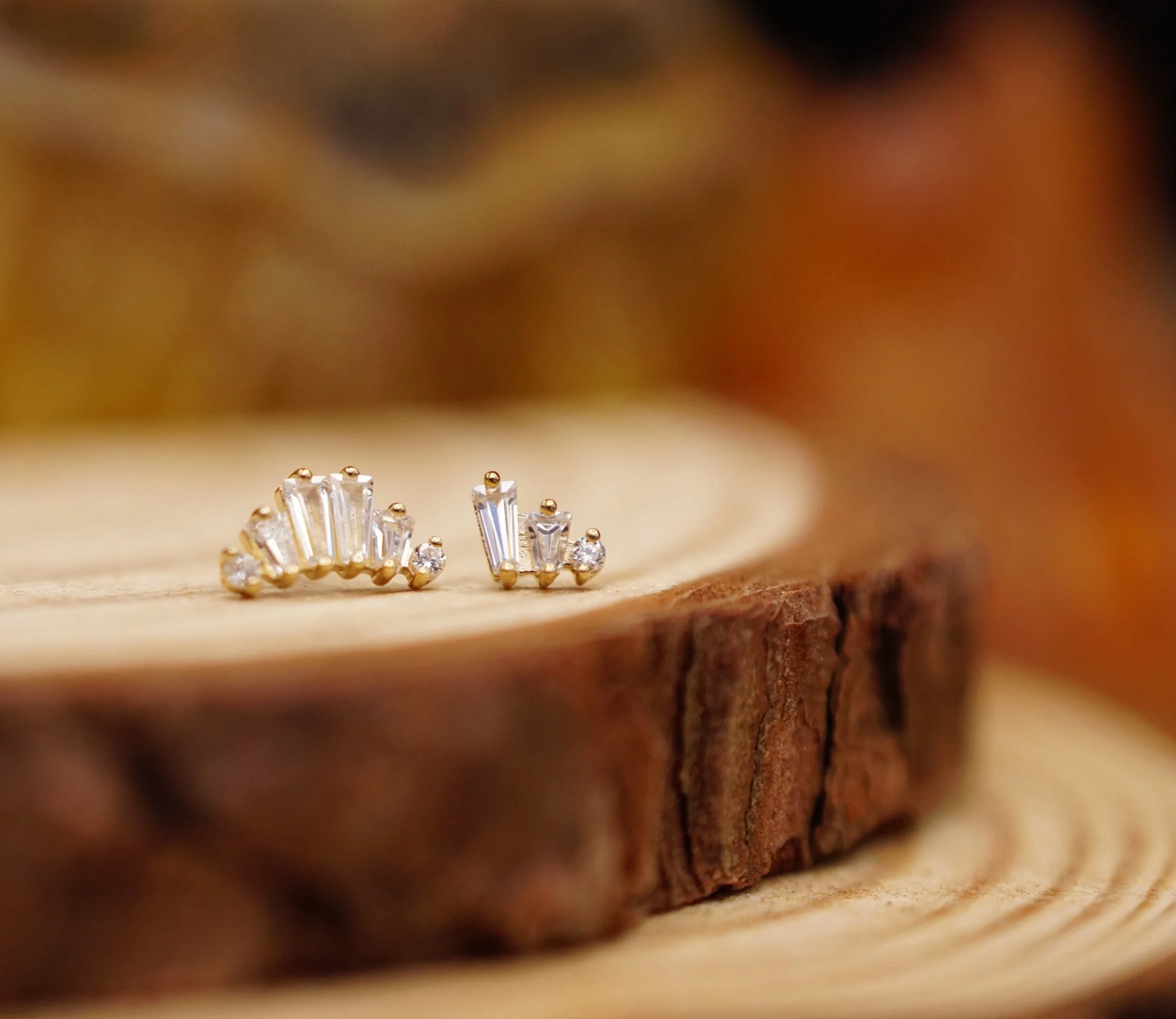 We love a modern twist to a classic design. The &lsquo;Obsession&rsquo; and the &lsquo;Sequence&rsquo; add a round stone to either side of the timeless tapered baguette design and we&rsquo;re definitely obsessed with them! Thanks to @emberbodyjewelry