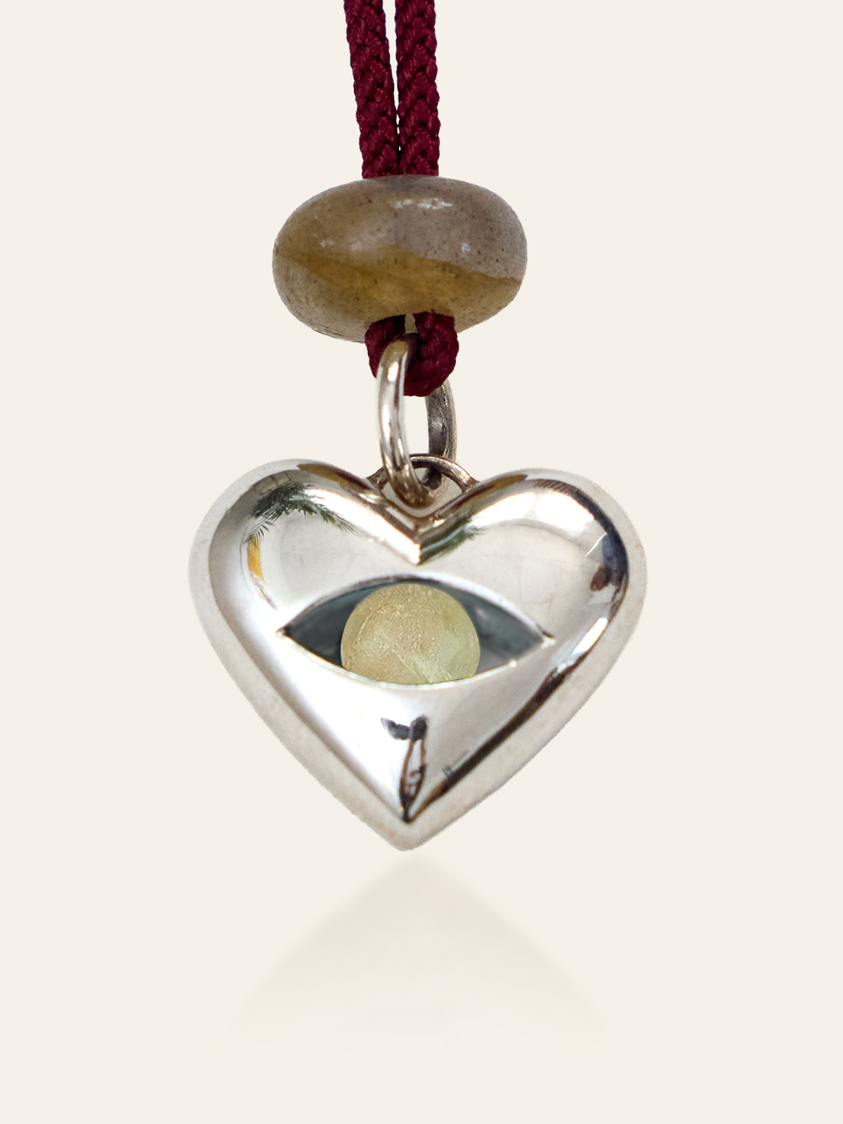Sterling Silver Moving Eye Heart Pendant, Peridot, by Elaine Chong Designs