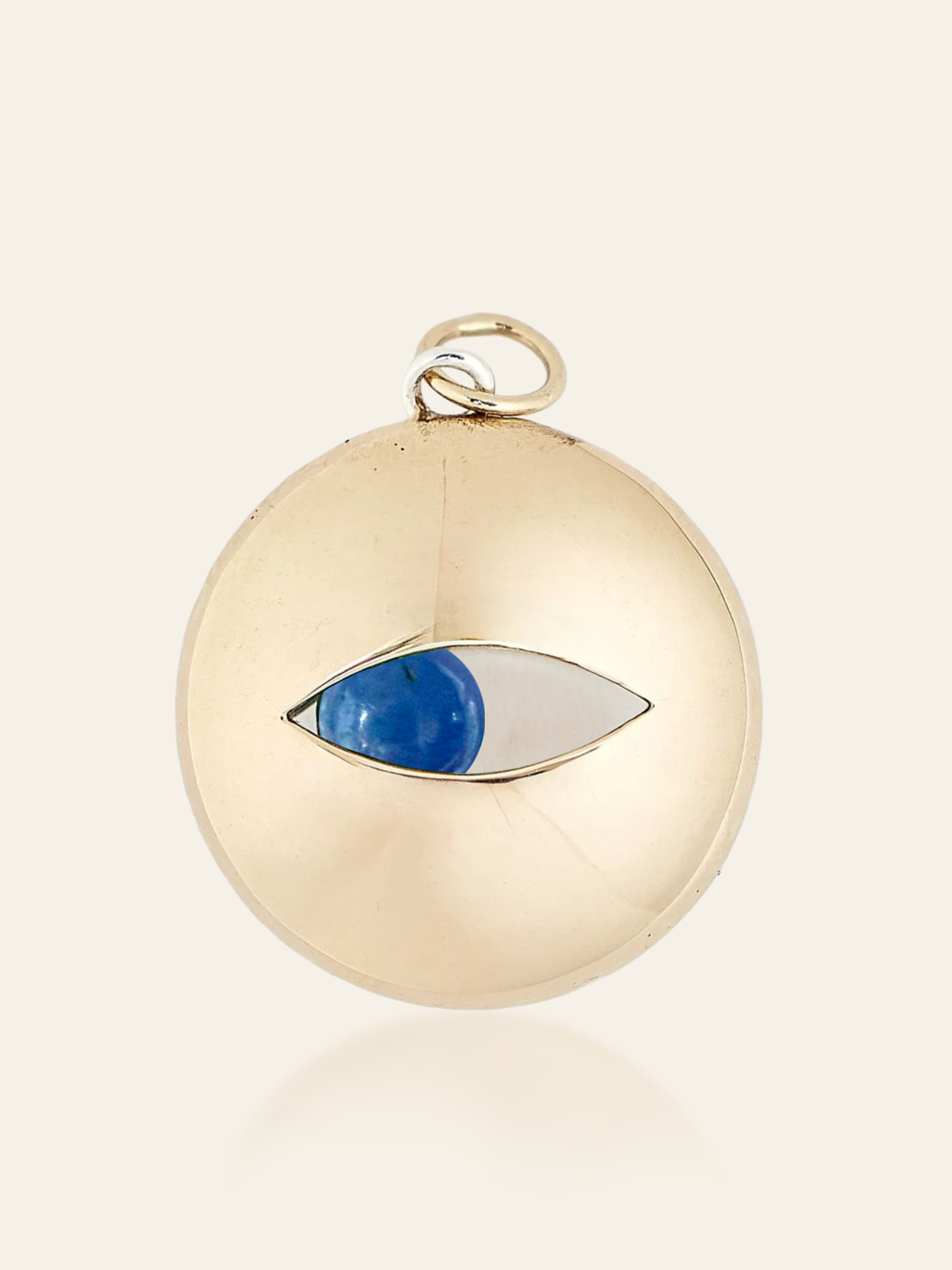pendant-movingeye-mixedmetal-LBT.pngMixed Metal Eye Pendant in 14K Gold and Sterling Silver with Moving Gemstone, Tanzanite, by Elaine Chong Designs