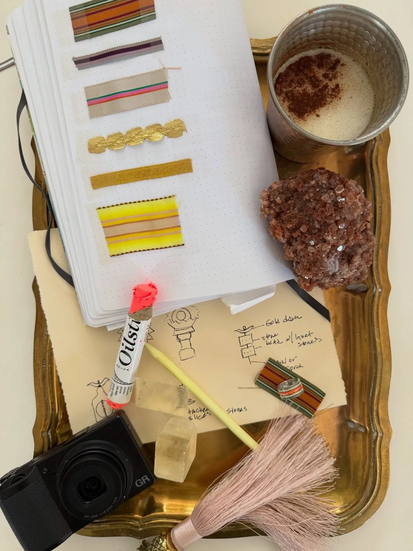 Studio Ledger 01
Materials in the studio this week:
Ribbon samples, camera always, ring sample, rough sketches, coffee &amp; crystals