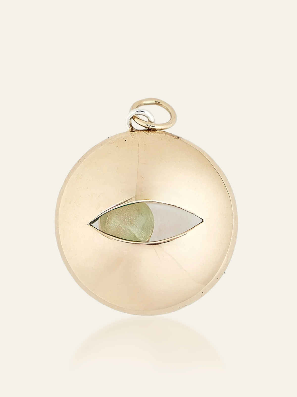 pendant-movingeye-mixedmetal-LBT.pngMixed Metal Eye Pendant in 14K Gold and Sterling Silver with Moving Gemstone, Peridot, by Elaine Chong Designs