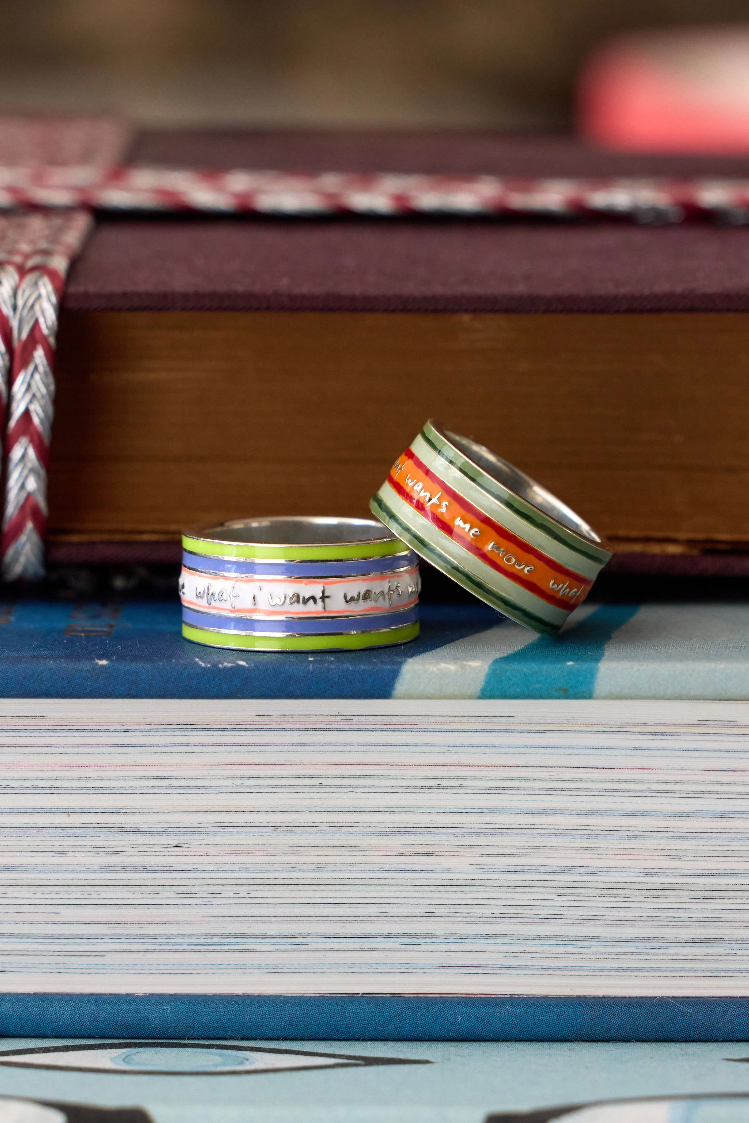 Sterling Silver Cigar Bands on book, by Elaine Chong Designs