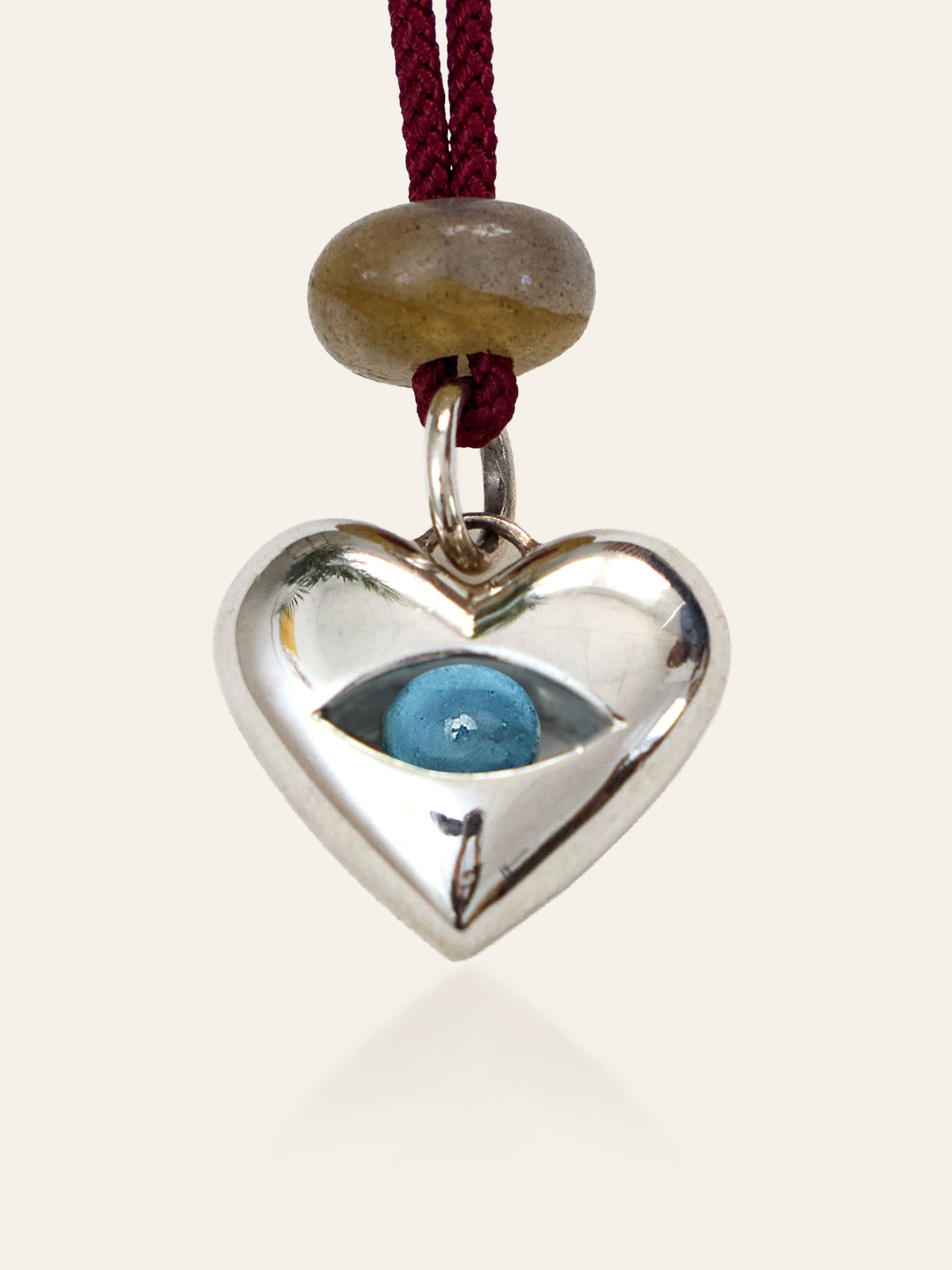 Sterling Silver Moving Eye Heart Pendant, London Blue Topaz, by Elaine Chong Designs