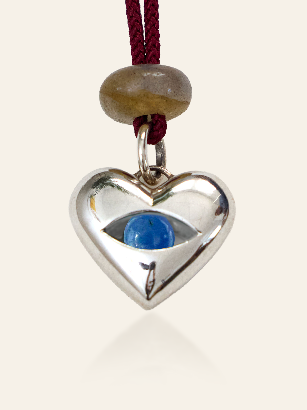 Sterling Silver Moving Eye Heart Pendant, Tanzanite, by Elaine Chong Designs