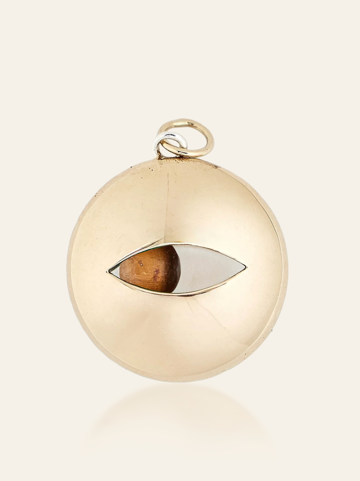 pendant-movingeye-mixedmetal-LBT.pngMixed Metal Eye Pendant in 14K Gold and Sterling Silver with Moving Gemstone, Tigers Eye, by Elaine Chong Designs