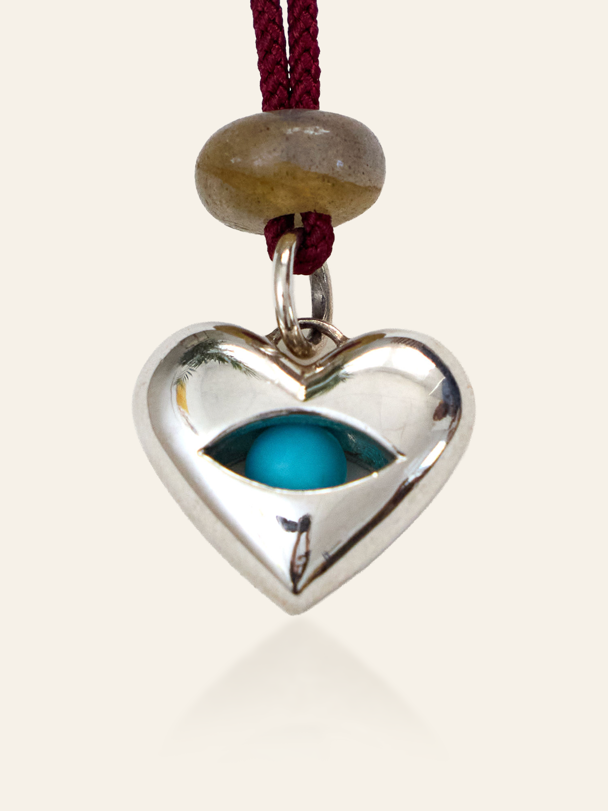 Sterling Silver Moving Eye Heart Pendant