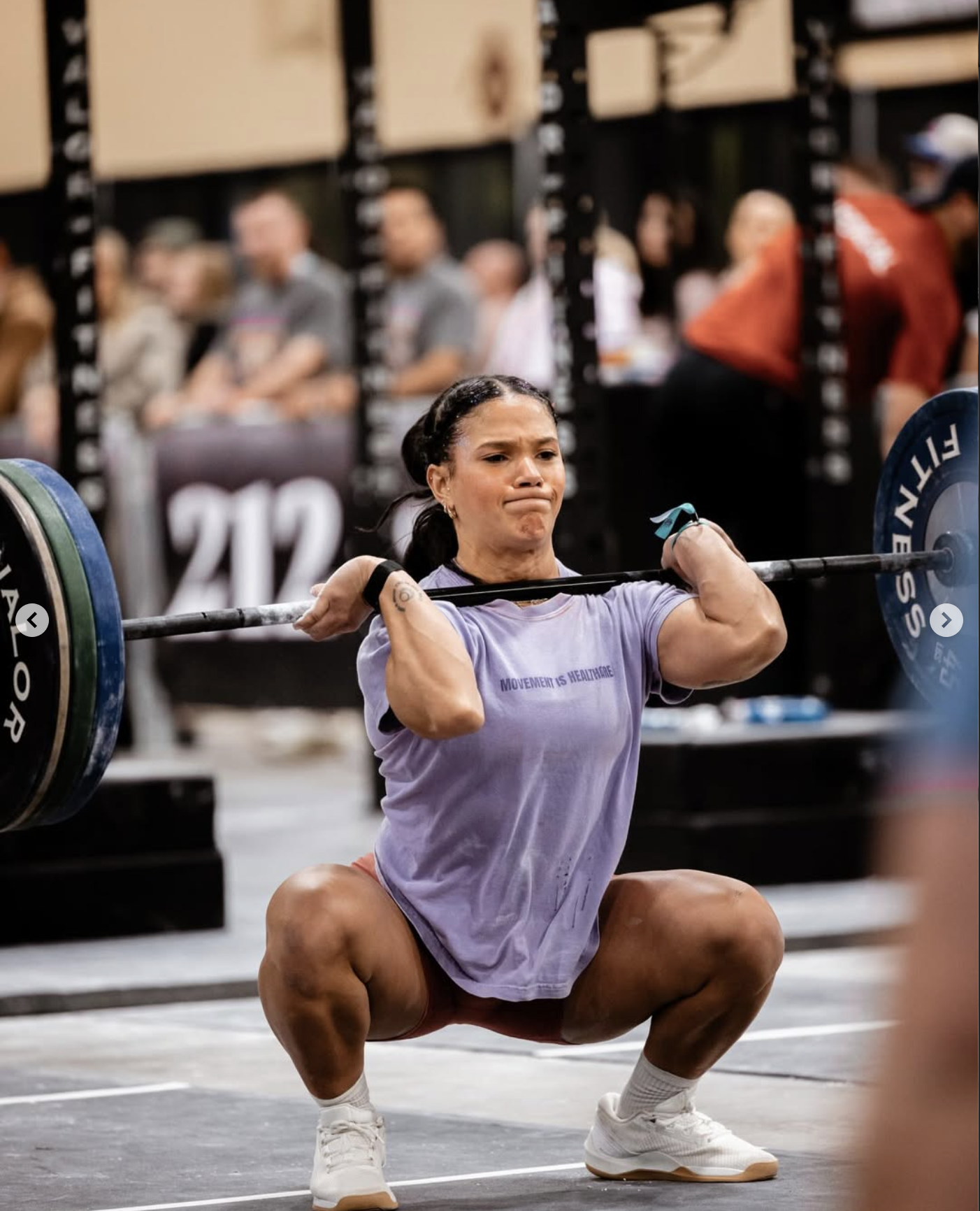 A physiotherapist providing medical treatment to a patient lying on a therapy table.
