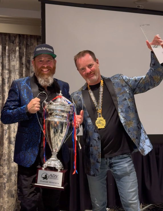 Sean Ross at the awards banquet with the silver perpetual Overall Winner's trophy