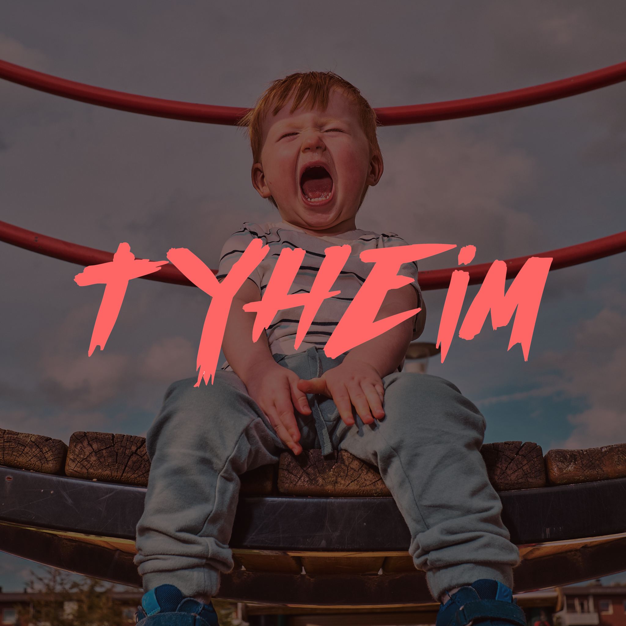 A young boy sitting on a playground equipment, yelling with his eyes closed and mouth open, with a cloudy sky in the background, and the words 'T YHE IM' written across the image in pink, stylized text.