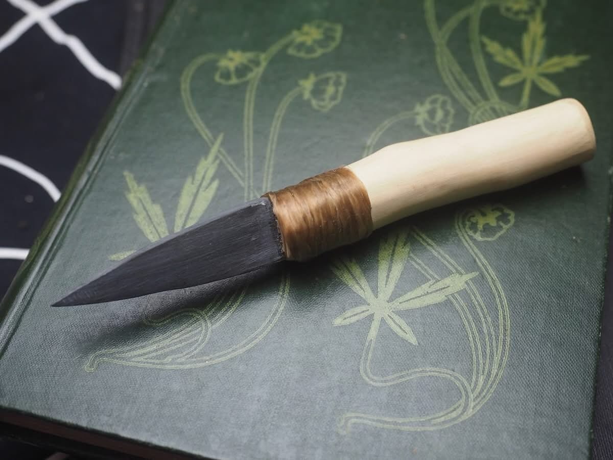 I love this little athame! Blackthorn wood handle and a welsh slate blade, it&rsquo;s small, packs a punch and is very definitely for energetic work only - slate is soft stone and not for cutting physical object - it&rsquo;s also not really a travel 
