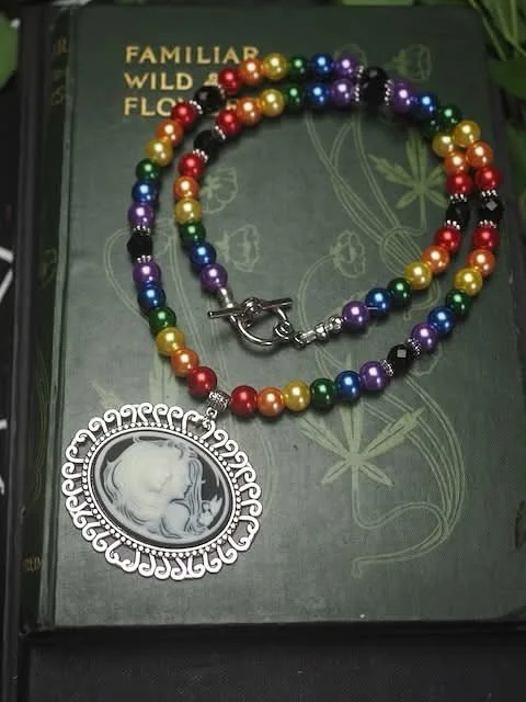 I happened upon some rainbow coloured faux pearls - in part wanting to make a special birthday gift for a dear friend, and also because we queer folk deserve jewellery made just for us.  Find them all in my et*y place - and yes! I am able to ship to 