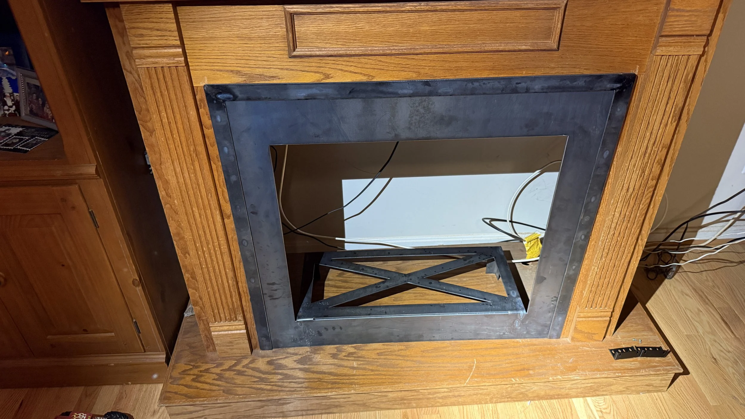 Fireplace with metal shroud replacement