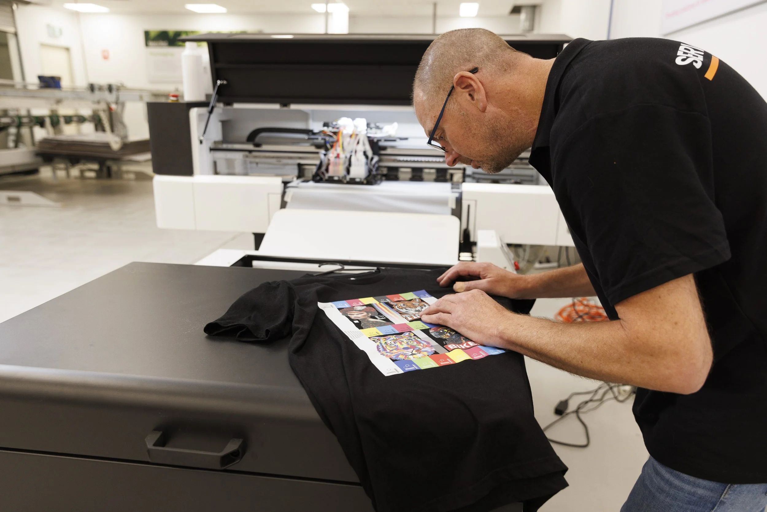 DTF printer setup printing design on transfer film for garment production