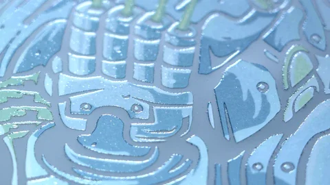 dtf transfer close up showing cured adhesive layer after powder melting into ink during curing process