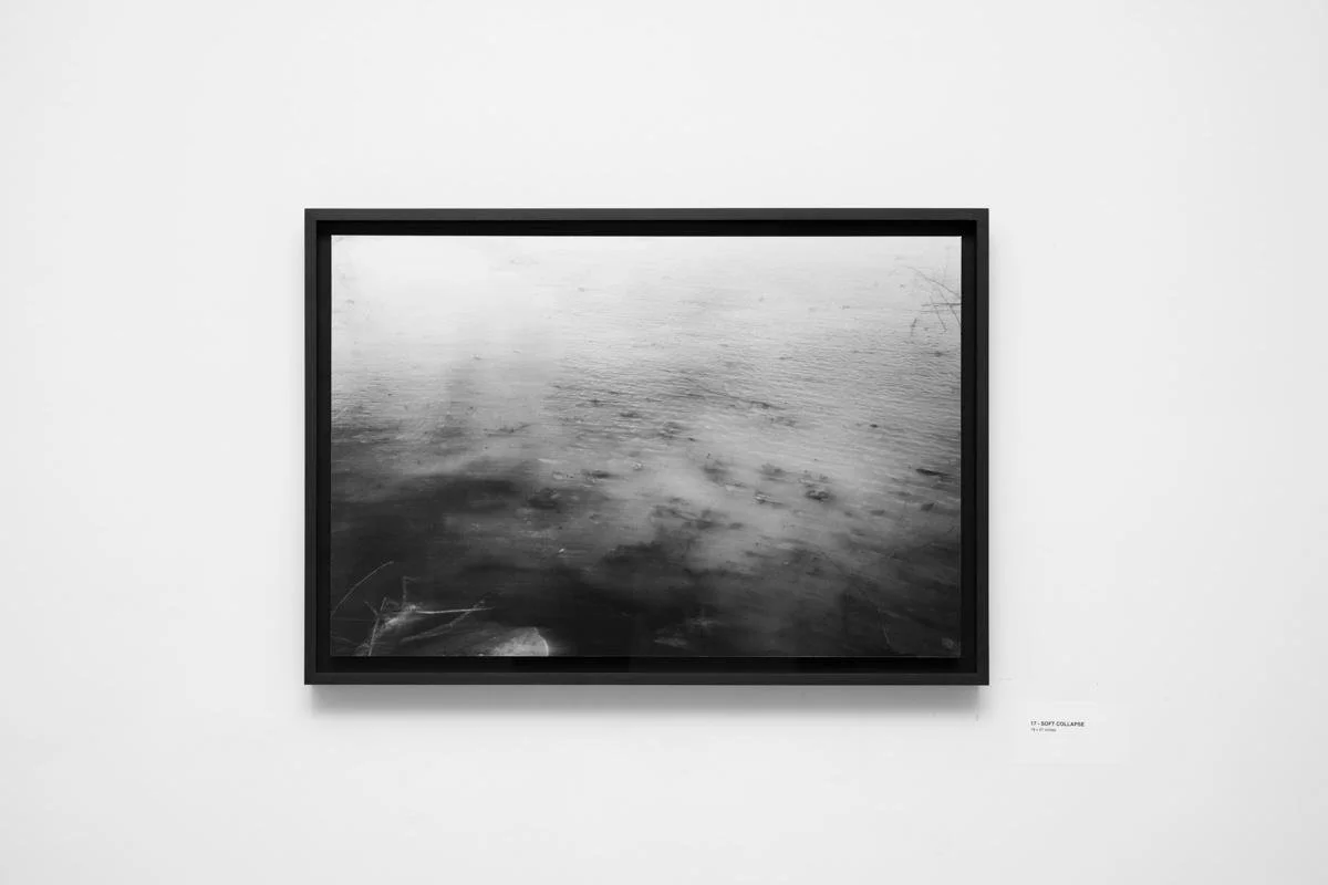 Inkjet print mounted on Dibond, floated over a black rag mat, framed in black-rubbed maple.