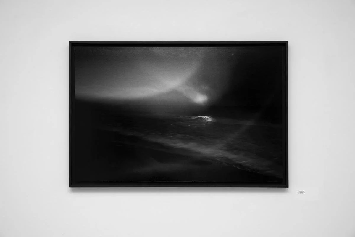 Inkjet print mounted on Dibond, floated over a black rag mat, framed in black-rubbed maple.