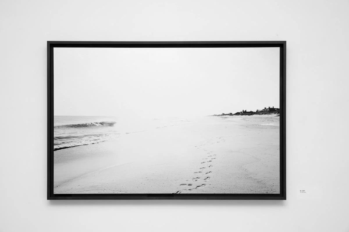 Inkjet print mounted on Dibond, floated over a black rag mat, framed in black-rubbed maple.
