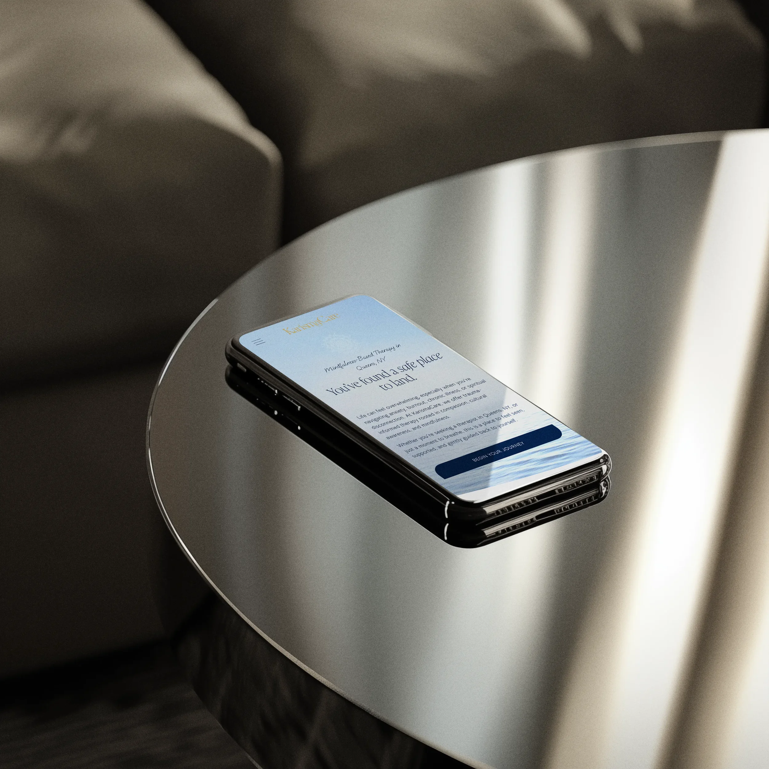 iphone with therapy website showing on screen