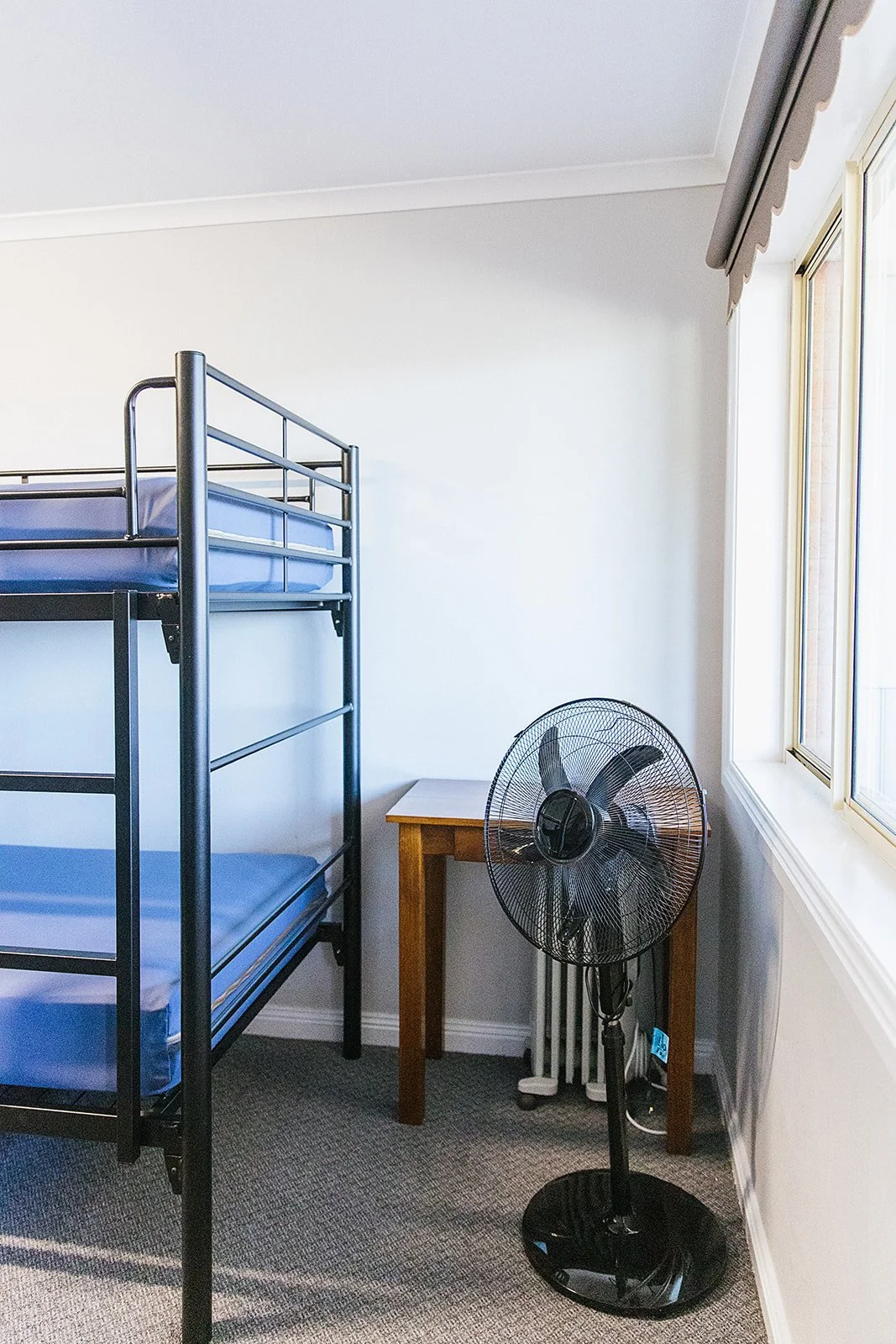 Rooms contain pedestal fan and oil heaters