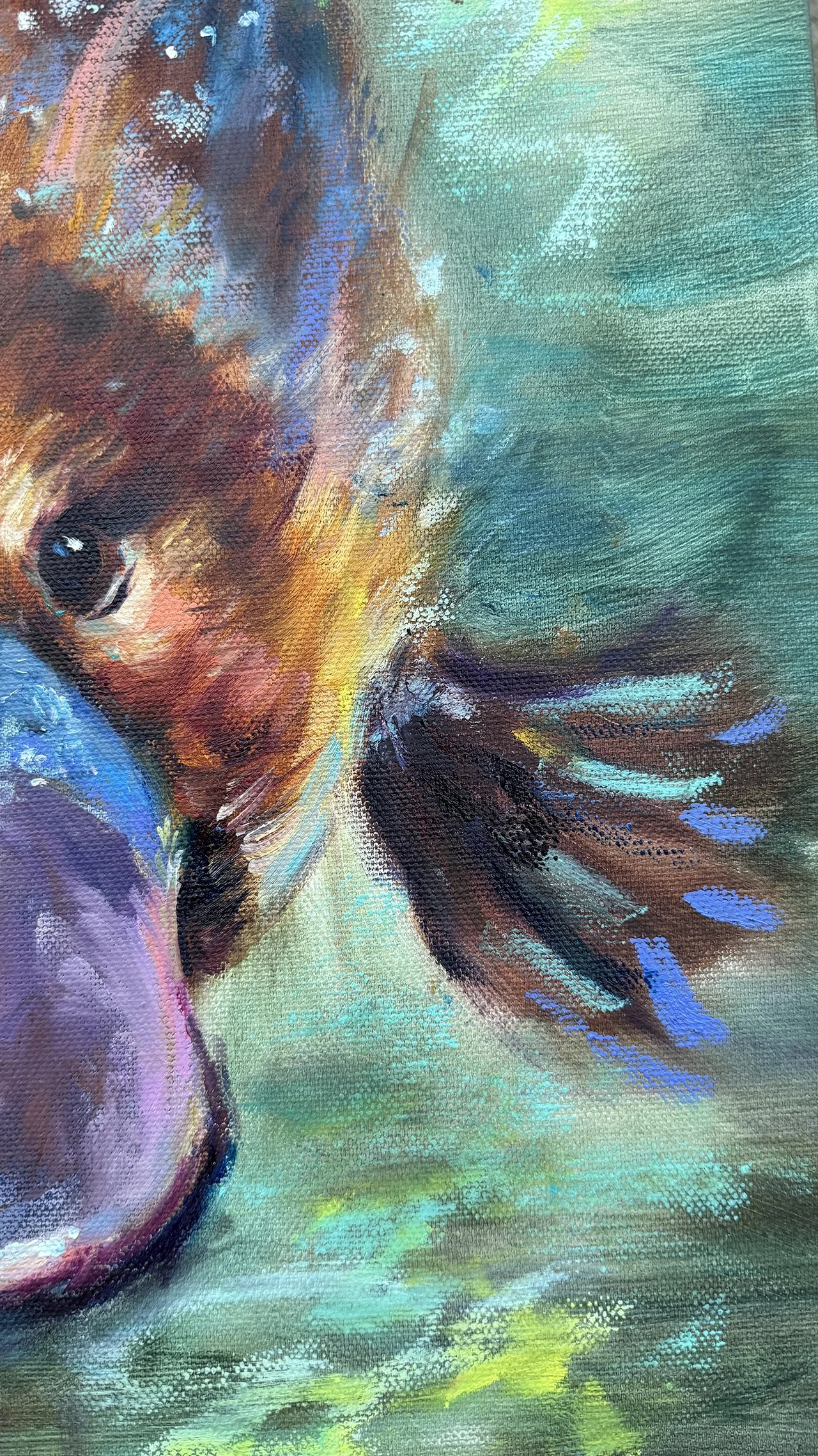 Close-up of rippling water with bubbles and layered colour around feet of the platypus.