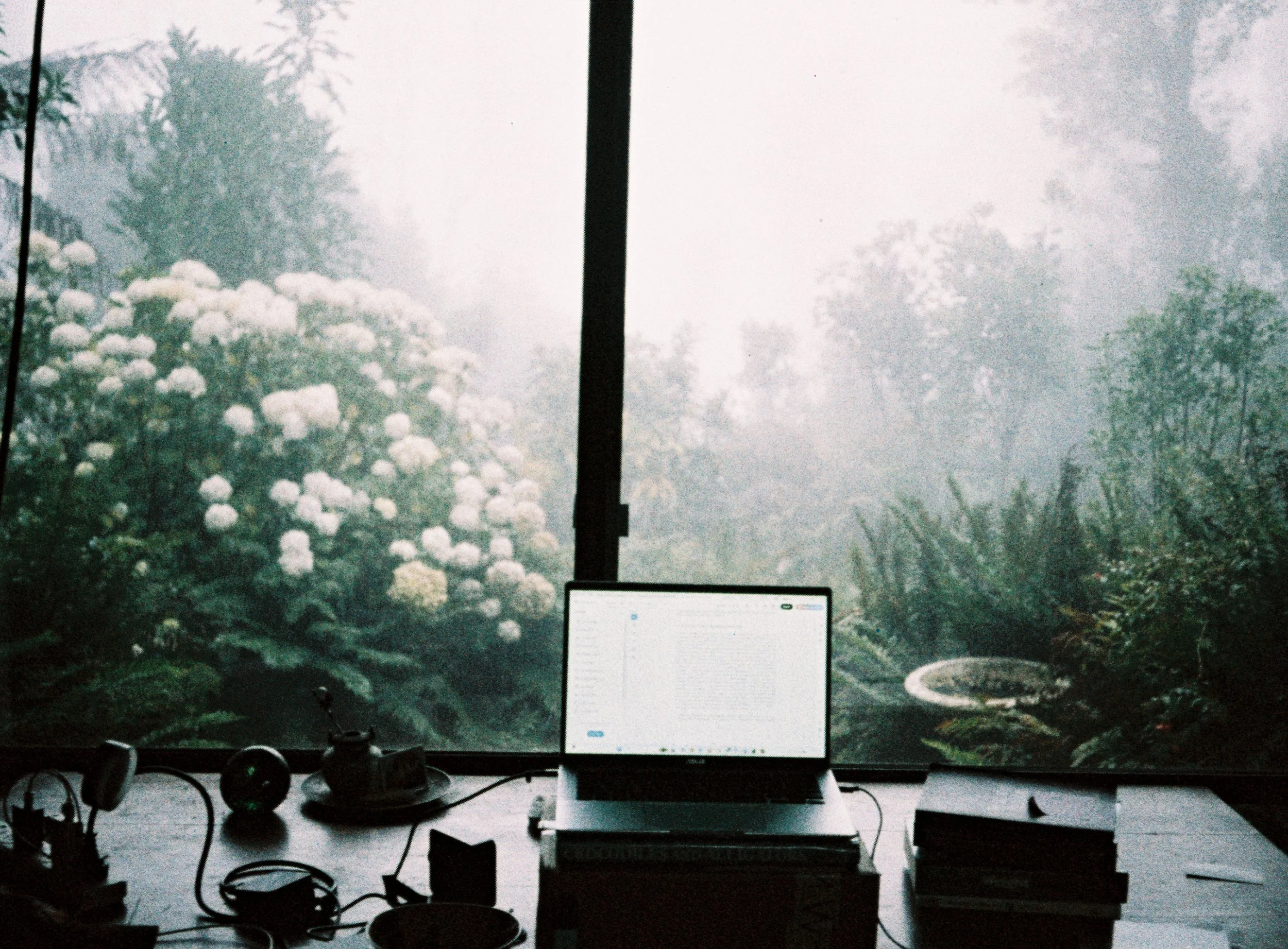 Writing at Val’s desk (photo by Tim Gentles, 2026).