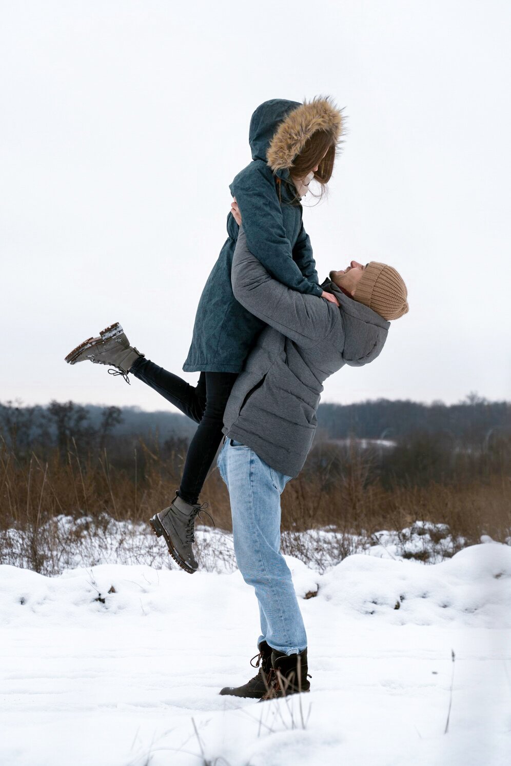 full-shot-man-holding-woman-up_23-2149248967.jpg