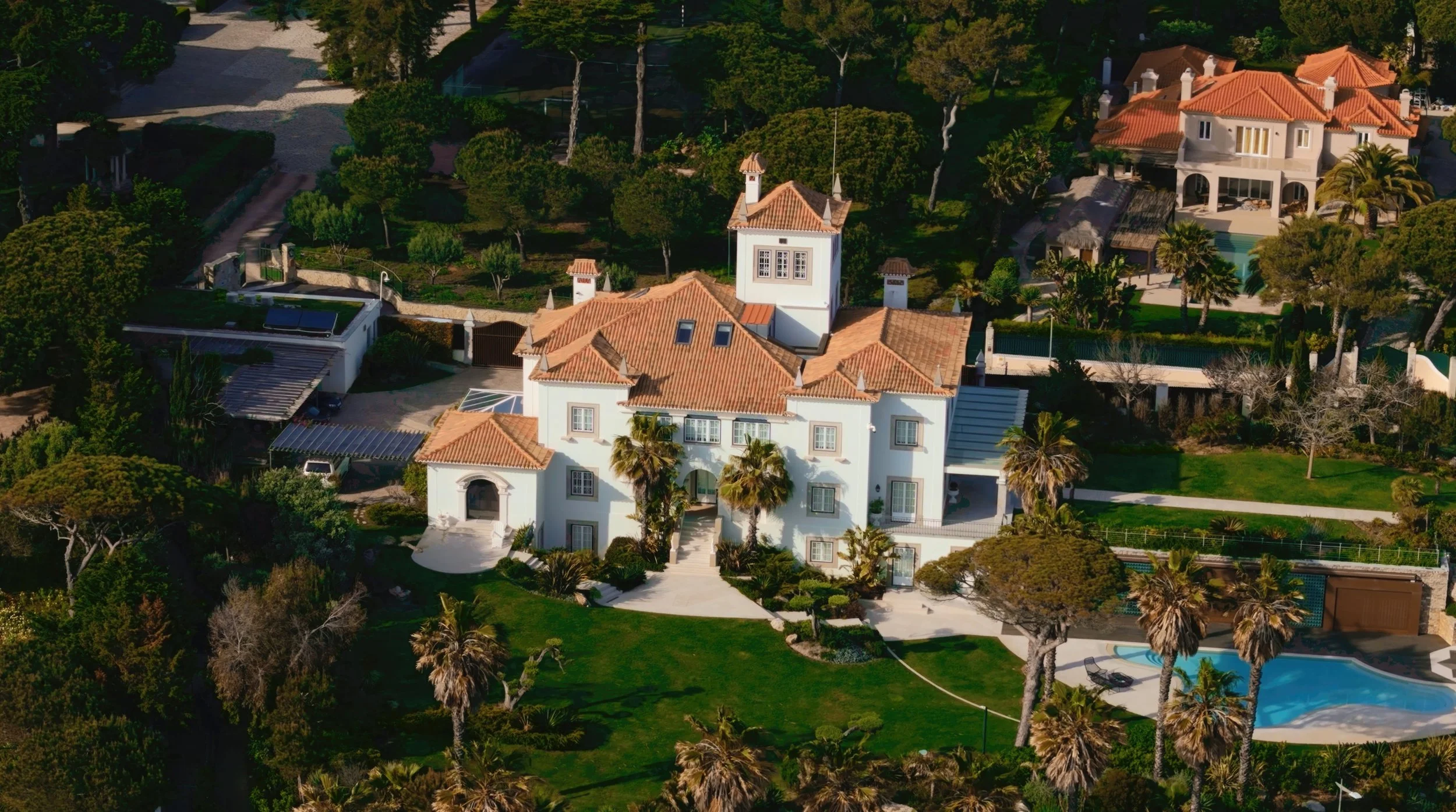 Drone photo of a villa with gardens and a pool, Portugal