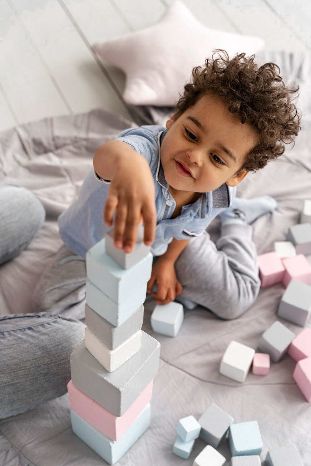 close-up-child-enjoying-didactic-game_23-2149316891.jpg