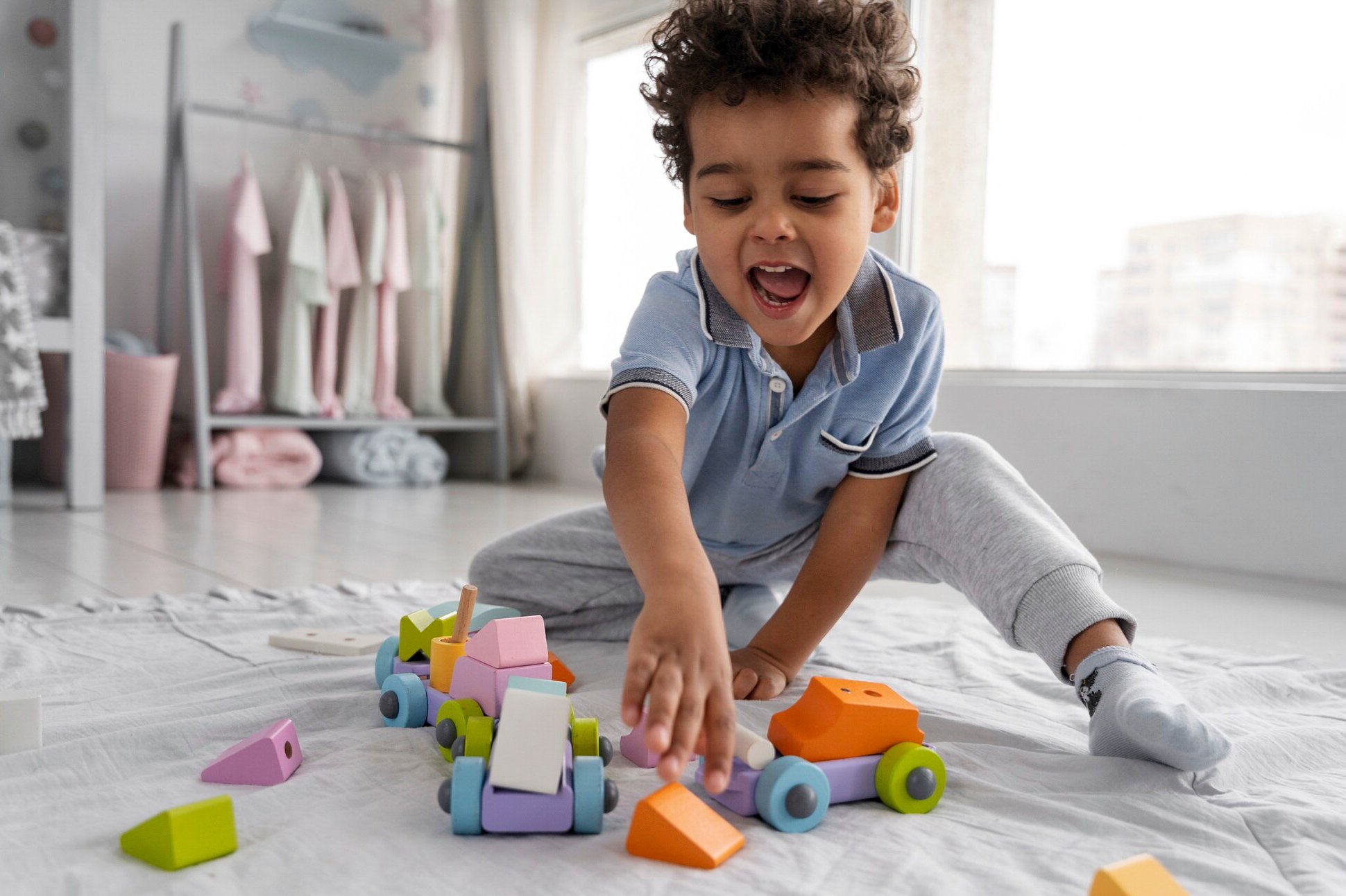 close-up-child-enjoying-didactic-game_23-2149316923.jpg