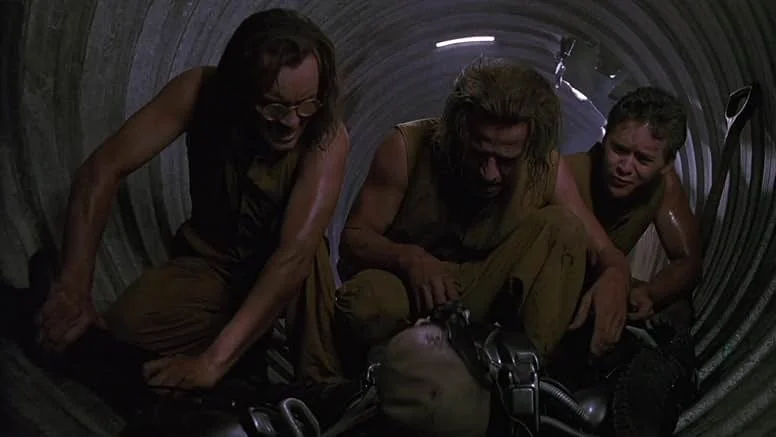 Christopher Lambert, Jeffrey Combs, and Clifton Collins Jr. in Fortress (1992)