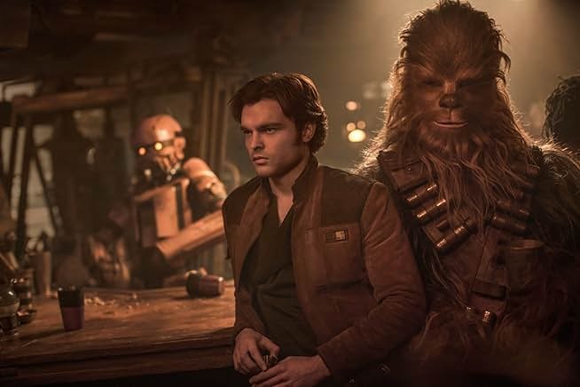 Alden Ehrenreich and Joonas Suotamo in Solo: A Star Wars Story (2018)