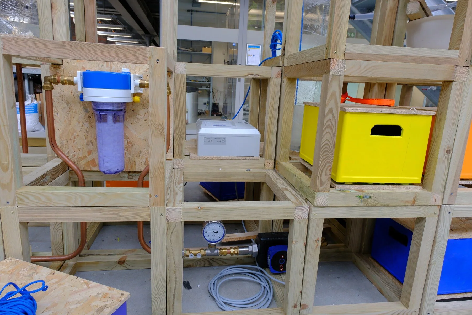 Rain Vessel’s pump, pipework and treatment equipment fitted within the timber modules.