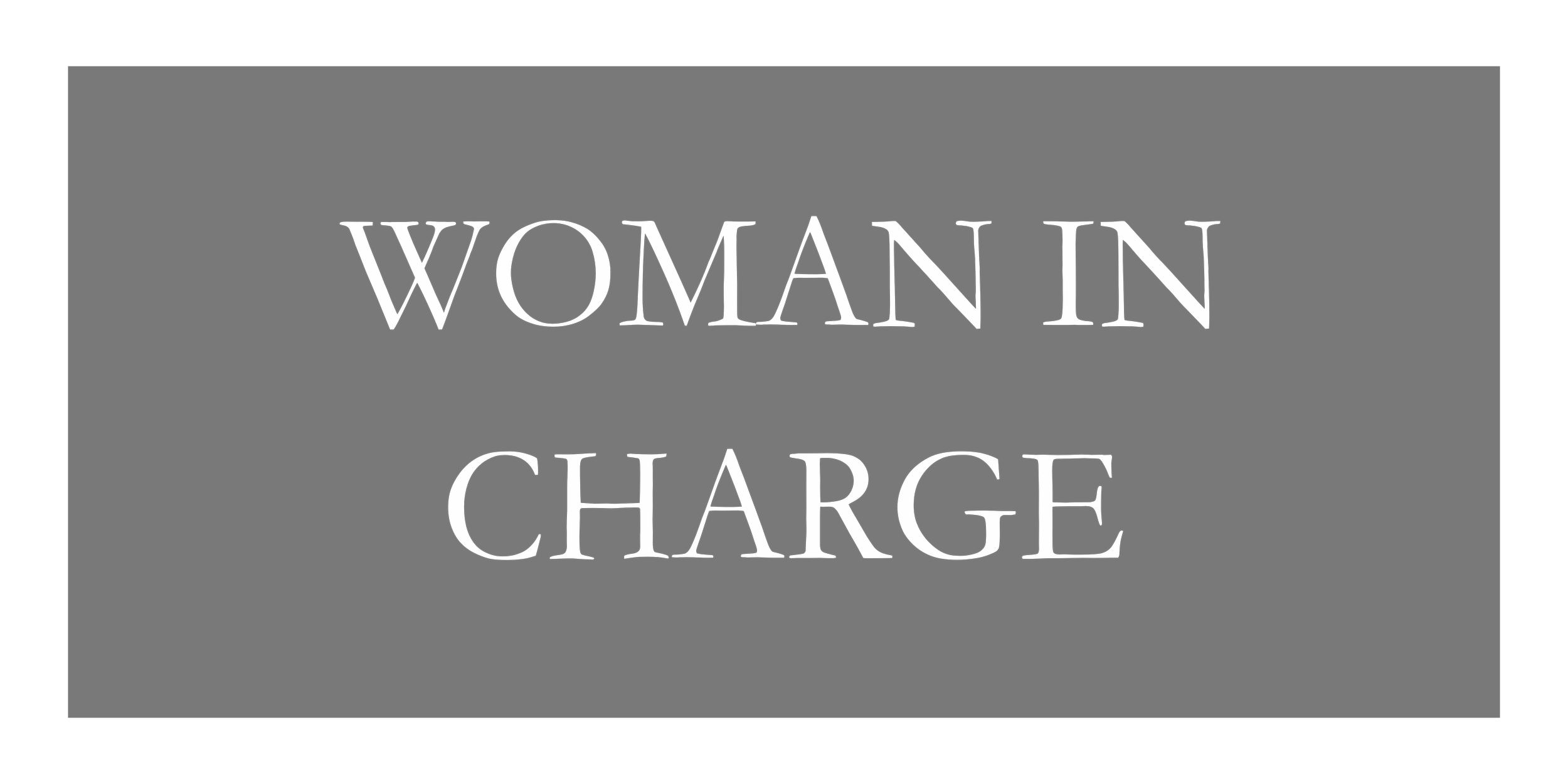 Text on black background reads 'Woman in Charge' in white capital letters.