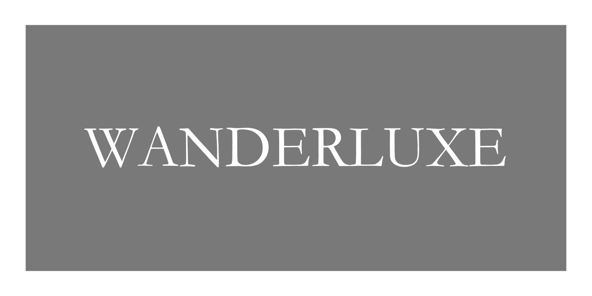 The word "WANDERLUXE" written in large white letters on a black background.