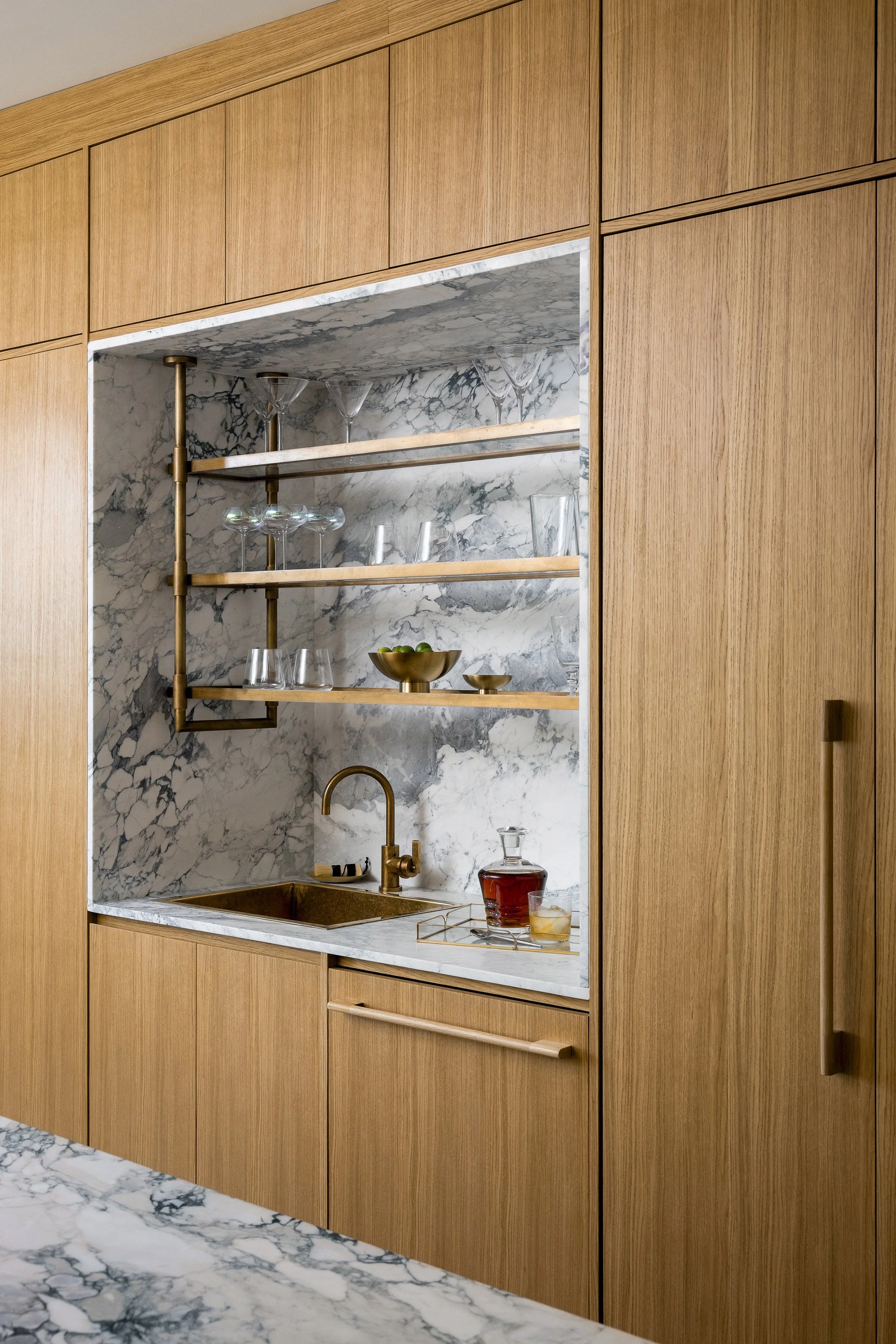 Garrison Foundry Architecture white oak modern kitchen Hudson Valley marble inset bar area with brass shelves