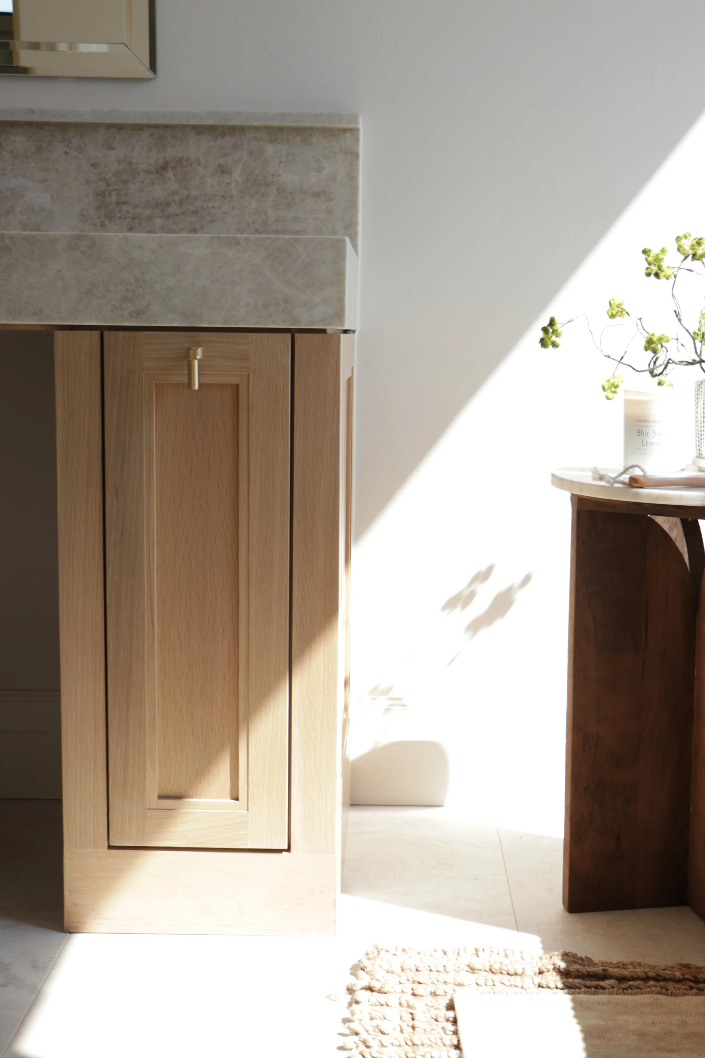 Rift-sawn white oak bathroom vanity with modified shaker doors in Oklahoma City.