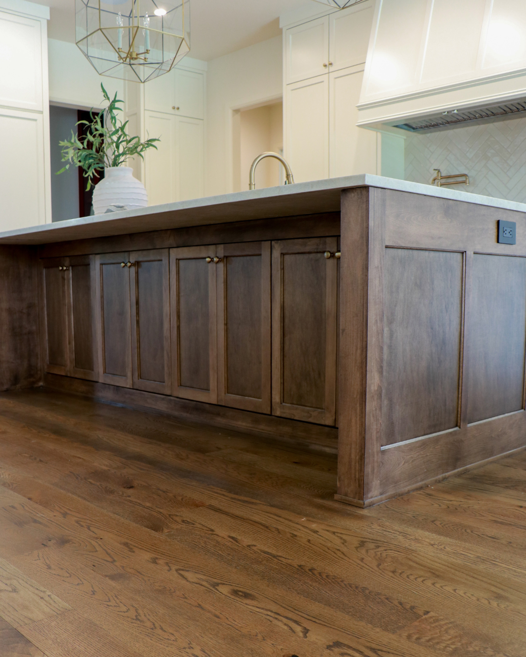 Custom kitchen island with modified shaker doors in OKC.