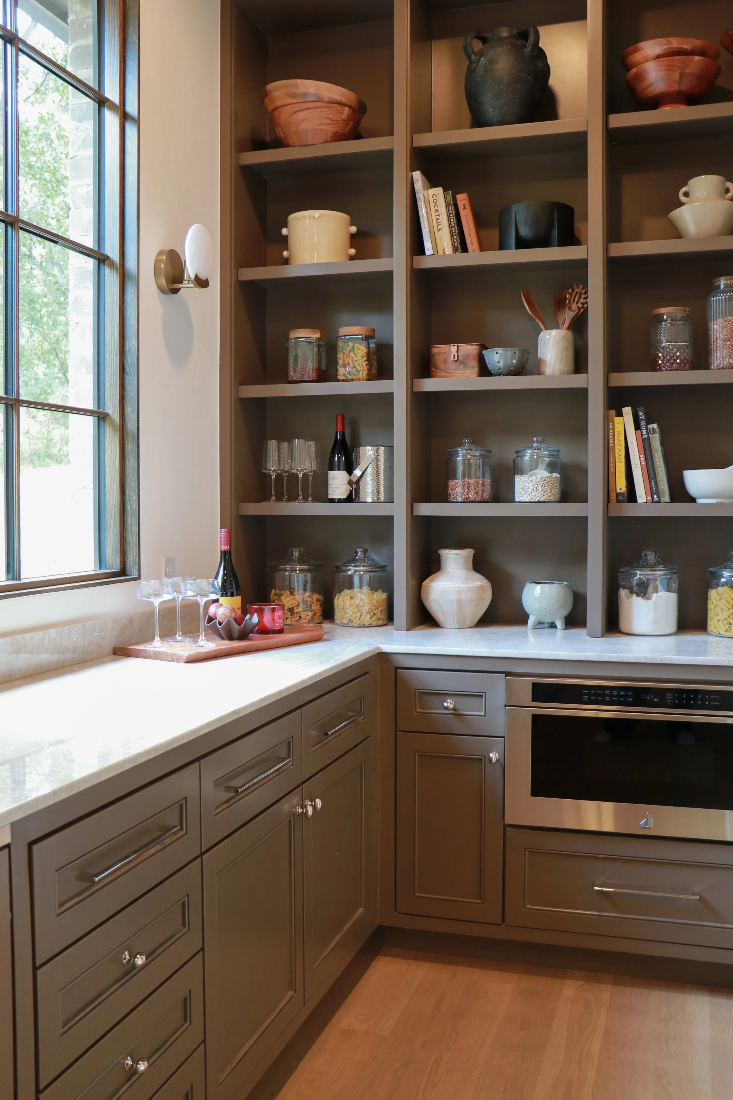 Custom butler's pantry with open shelving and modified shaker doors with added bead in OKC.