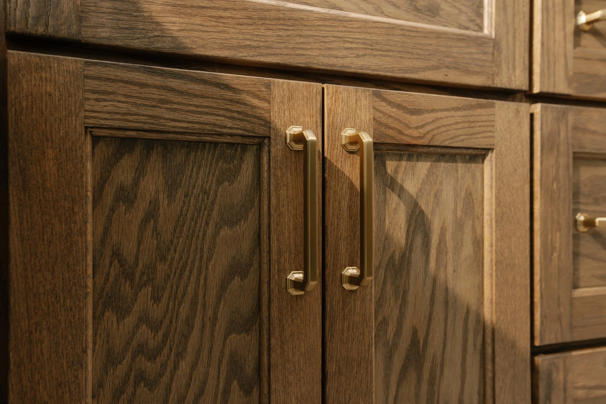 Red oak cabinet with modified shaker doors in Oklahoma City.