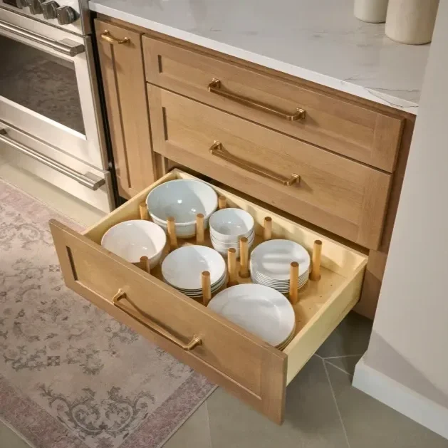 Kitchen cabinetry with peg board organizer in Oklahoma City.