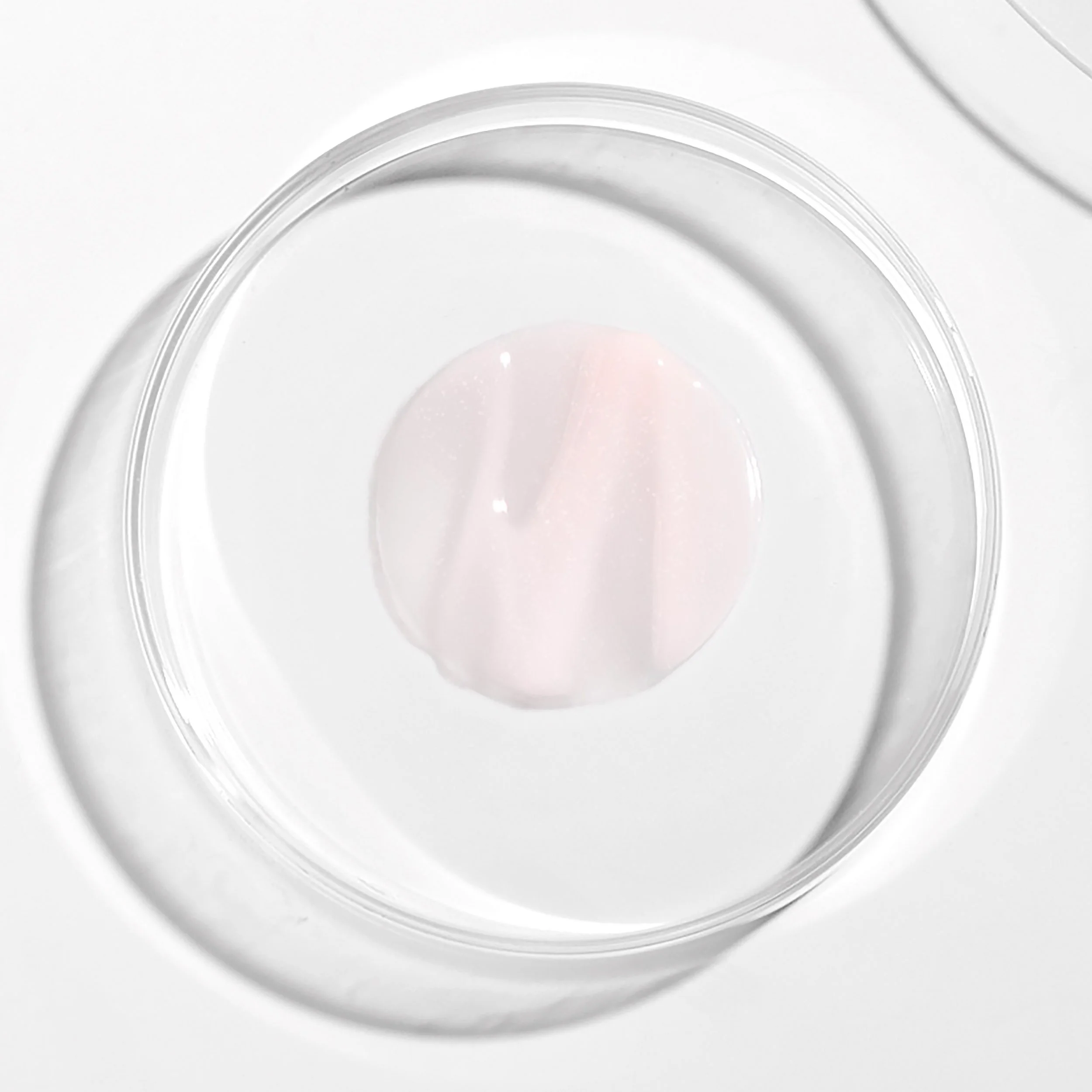 Tomate Glow - Soin Regard Renovateur Eclat - Texture.jpg